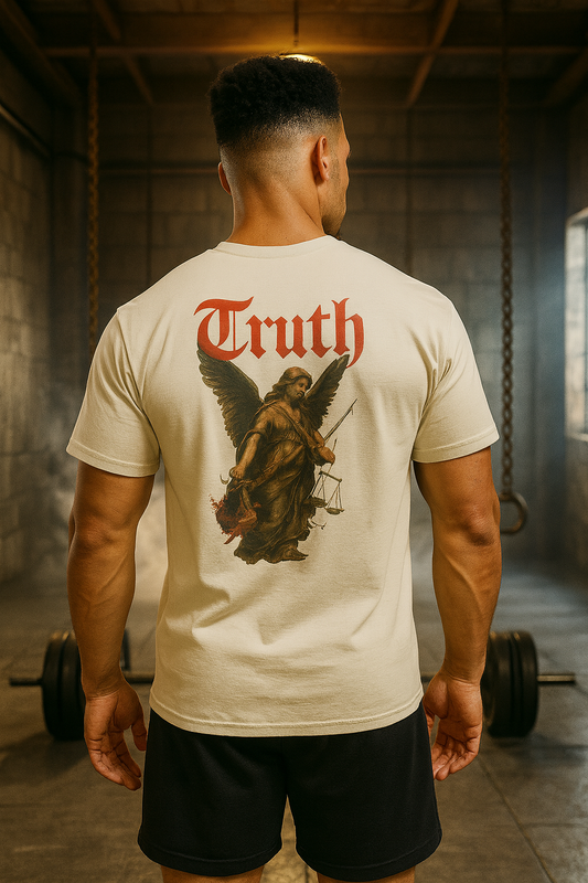 Man wearing a white t-shirt with a graphic design and the word 'Truth' in a gym setting