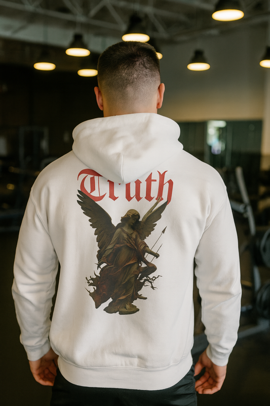 Person wearing a white hoodie with 'Truth' and an angel graphic on the back in a gym setting.