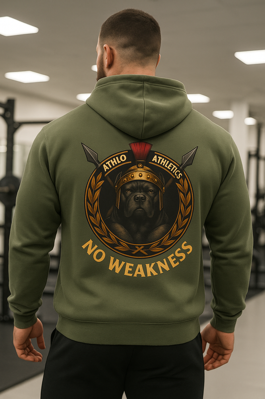 Person wearing a green hoodie with a logo and text in a gym setting